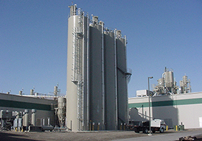 Four bulk storage silos that are a part of an automation system